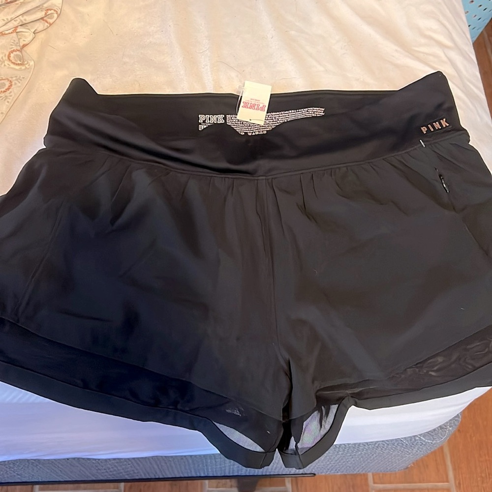 short pink ultimate in black color